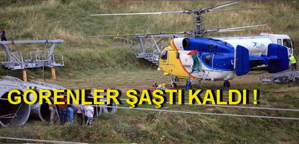 ELEKTRİK DİREKLERİNİ HELİKOPTERLE TAŞIDILAR (VİDEOLU)